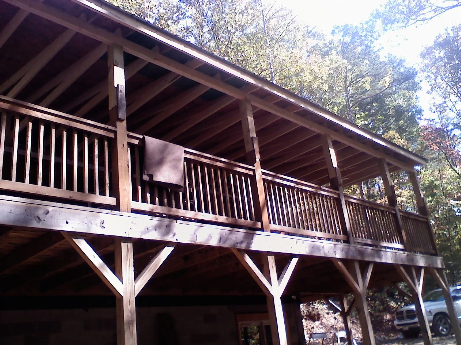 Timber framing under a new elevated porch and deck — Roof Leak Repair in Temple Hills by Roofing Brothers